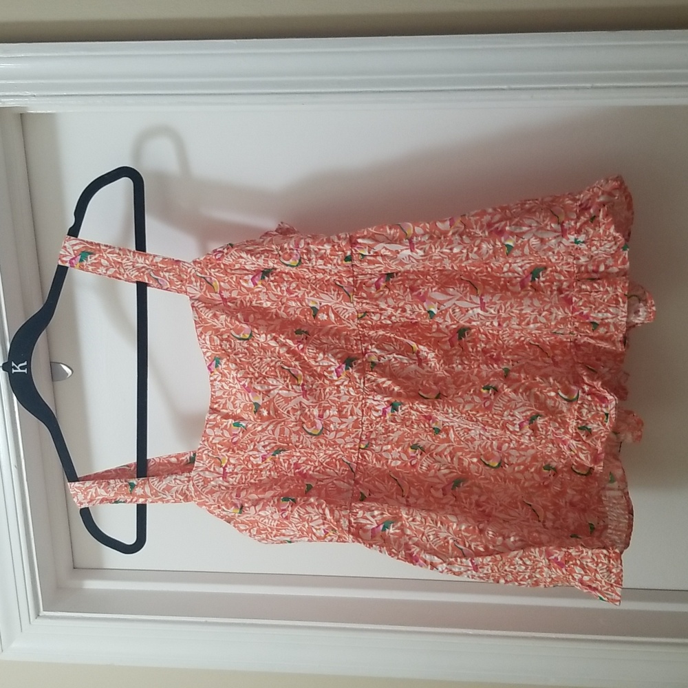 Super cute Loft top with tie back detail and ruffle bottom